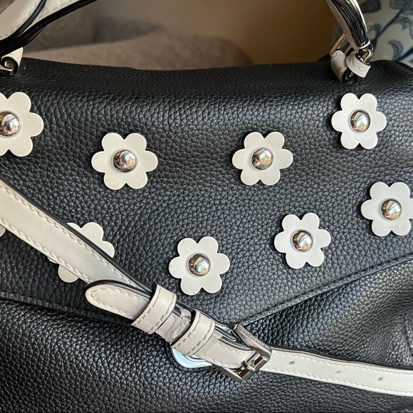 bristol small floral appliqu leather backpack with Applique Design This black Bristol Satchel from MICHAEL Michael Kors is crafted from leather in a fold MICHAEL Michael Kors Bristol Small